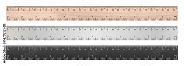 Fototapeta School rulers in centimeters. Set of three rulers isolated on a white background. Wooden ruler with inch and centimeter markings
