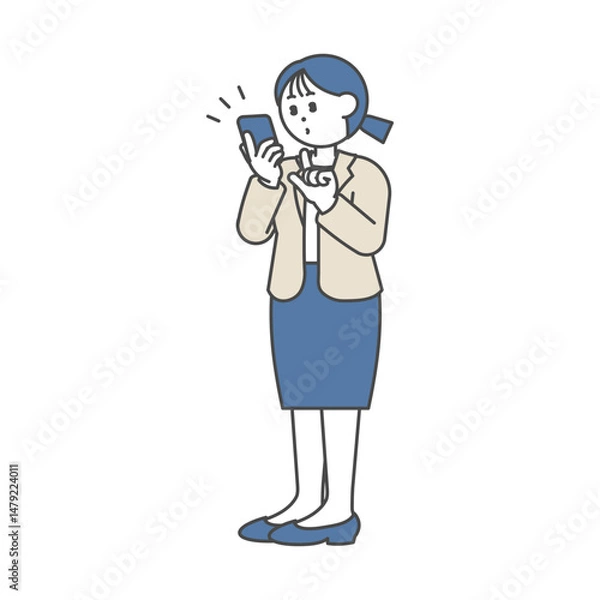 Obraz スマホをチェックするビジネス女性