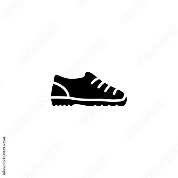 Obraz Side view of a rugged hiking shoe with laces and treaded sole for outdoor activities