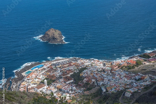 Fototapeta Aerial view of old town Garachico from Mirador de Garachico view point. Colorful houses and harbor. Ocean shore with lava rock pools. Popular tourist destination, Tenerife Canary Islands.