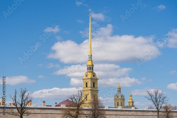 Fototapeta View of the Peter and Paul Cathedral. Ancient Peter and Paul Fortress in spring sunny day, view from Neva river. Saint Petersburg, Russia