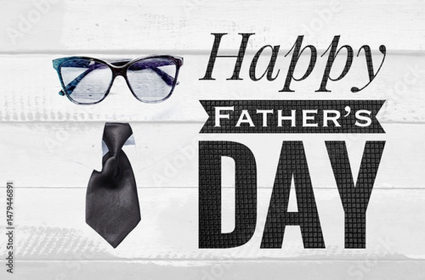 Fototapeta Happy Father's day card background idea, Father's day banner with sunglasses and black necktie on white wood background, greeting card background idea