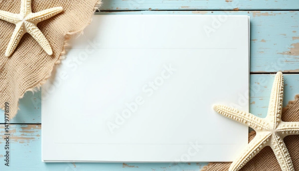Fototapeta Blue background with starfish and notebook decorations