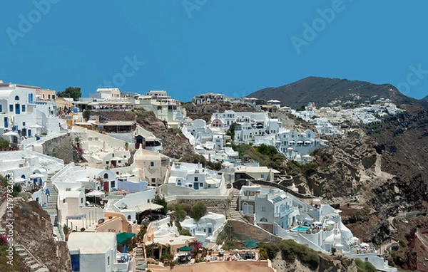 Fototapeta Oia village on the edge of cliffs at Santorini, Greece