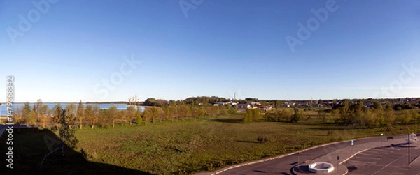 Fototapeta Panorama of Lake Myastro and the city of Myadel. Myadel district. Minsk region. Belarus