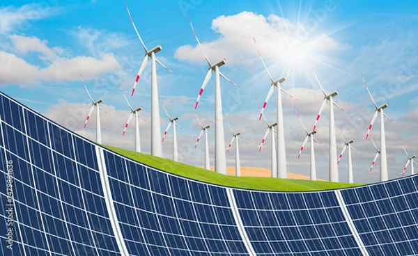 Obraz Nature green landscape with bright cloudy sky - Wind turbines farm on green field landscape - Solar Panel (Photovoltaic) with cloudy sky reflection