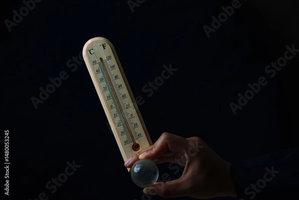 Obraz Thermometer measurement action indoor setting science content dark environment close-up viewpoint temperature concept