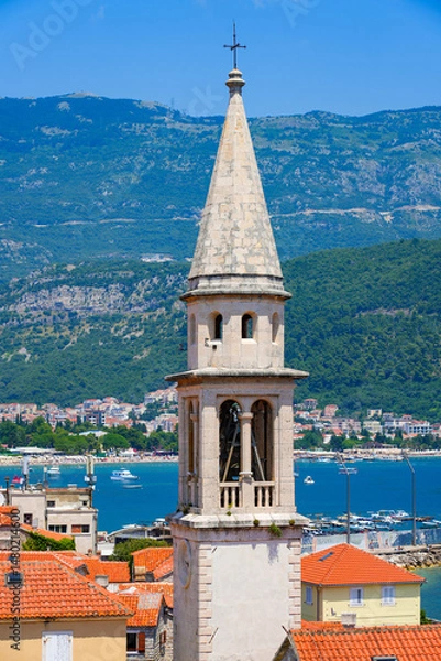 Fototapeta Bell tower of the church of Saint John the Baptist in the Old Town of Budva on the coast of the Adriatic Sea in Montenegro