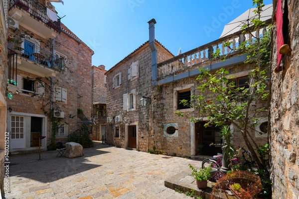 Fototapeta Square in the Old Town of Budva, a walled coastal city built by the Venetian Republic along the coast of the Adriatic Sea in Montenegro