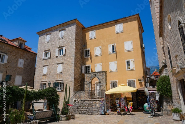 Fototapeta Stone house in the Old Town of Budva, a walled coastal city built by the Venetian Republic along the coast of the Adriatic Sea in Montenegro