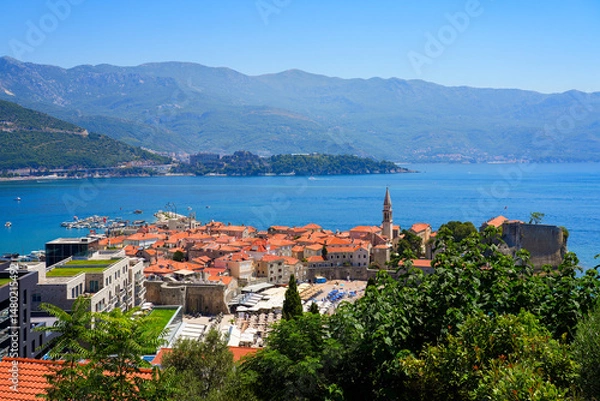 Fototapeta Aerial view of Budva Old Town, a famous resort town on the Montenegrin Riviera along the coast of the Adriatic Sea