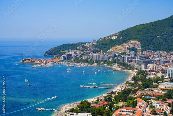 Fototapeta Aerial view of the beach of Budva, a famous resort town on the Montenegrin Riviera along the coast of the Adriatic Sea