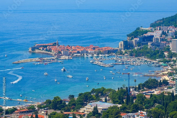 Fototapeta Aerial view of the bay of Budva, a famous resort town on the Montenegrin Riviera along the coast of the Adriatic Sea