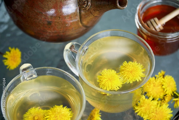 Fototapeta Overhead view of dandelion tea with fresh flowers and teapot