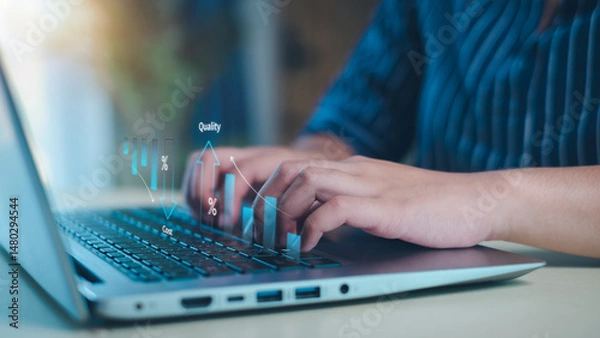 Fototapeta Business showing cost with down arrow and quality with up arrow and improvement quality of product and service.Quality control.