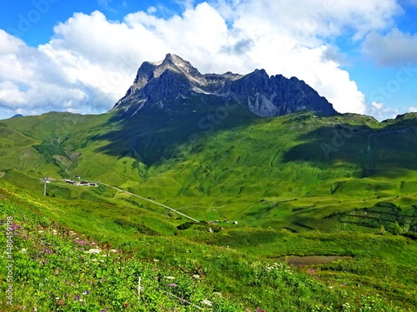 Fototapeta Austrian Alps - view of the Widderstein mountain and the village of Hochkrumbach near the town of Warth in the Lechtal Alps