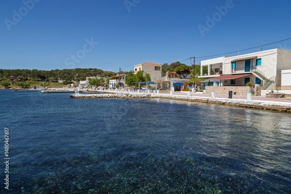 Fototapeta Idyllic village by the Aegean Sea on Telendos island in Greece on a sunny day.