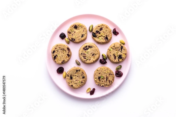 Fototapeta Tasty round homemade healthy biscuit made of oats, butter, nuts and dried fruits