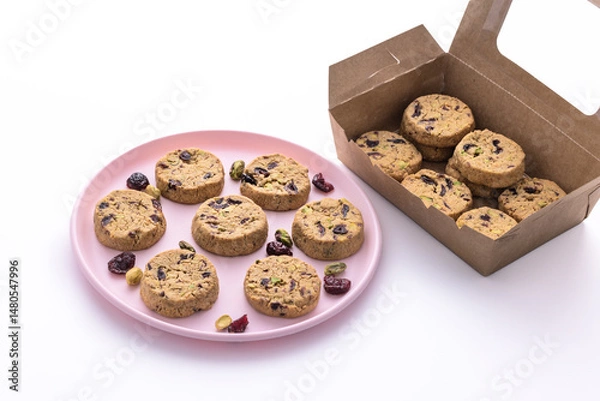 Fototapeta Tasty round homemade healthy biscuit made of oats, butter, nuts and dried fruits