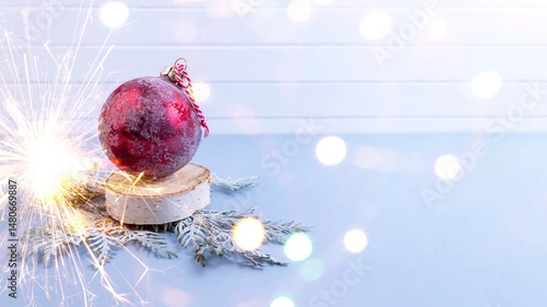 Obraz New Year or Christmas background with sparklers. Background of New Year's bokeh, Christmas mood, glitter, festive background.