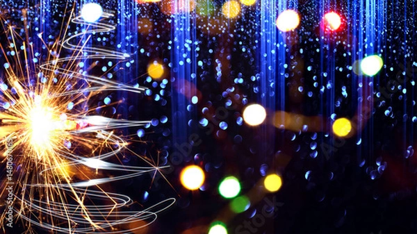 Obraz New Year or Christmas background with sparklers. Background of New Year's bokeh, Christmas mood, glitter, festive background.