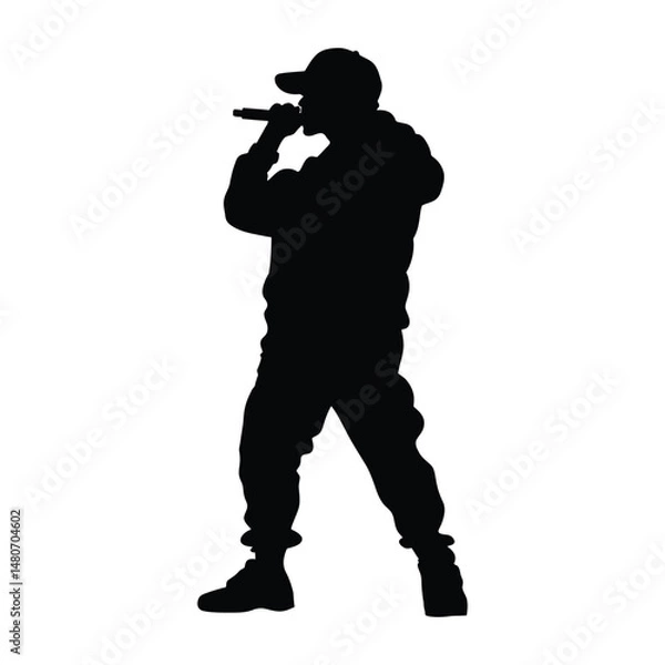 Obraz Powerful Silhouette of a Rapper Performing on Stage with a Microphone