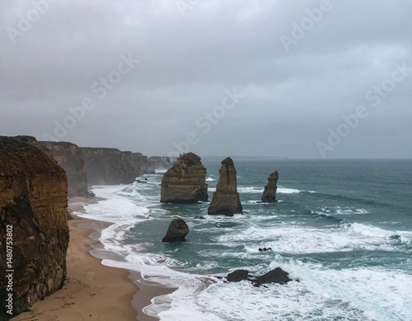 Obraz Rocky coastline during overcast weather, dramatic waves crashing against sea stacks