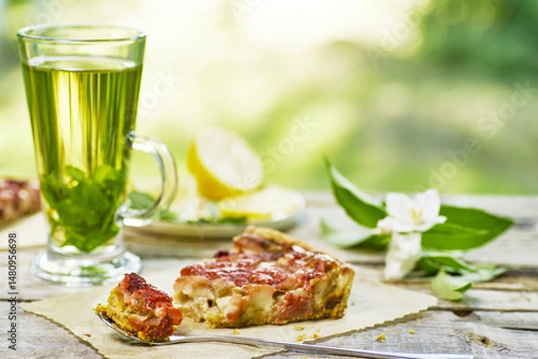 Obraz Enjoy a Refreshing Green Tea paired with a Savory Snack while surrounded by Natures beauty
