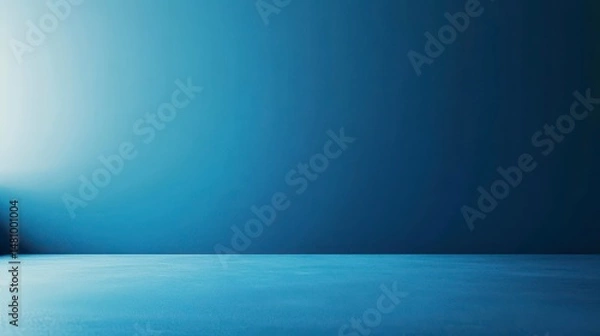 Fototapeta Simple blue studio background with gradient wall and floor.