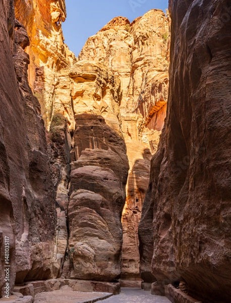 Obraz Water channels carved on both sides of the narrow gorge of the Siq entering Petra in Jordan