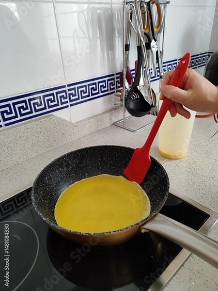 Obraz cooking protein crepes in the kitchen
