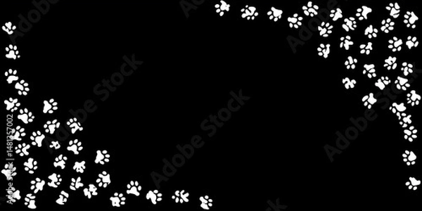 Fototapeta Cute white paw prints forming a corner frame on black background, perfect for pet-themed designs or invitations.