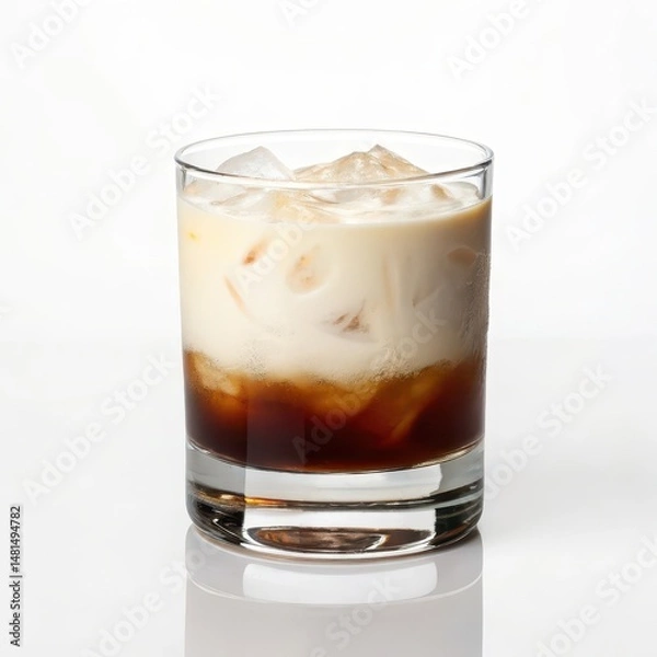 Fototapeta Rich and creamy white russian cocktail served in a glass captured in a side view highlighting its luxurious appearance