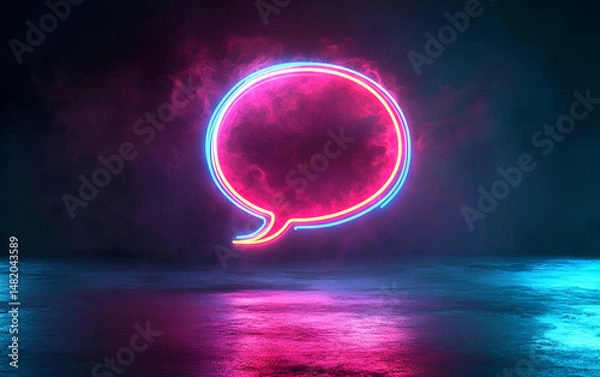 Obraz Vibrant neon speech bubble glowing against a dark, misty background, representing communication and dialogue.