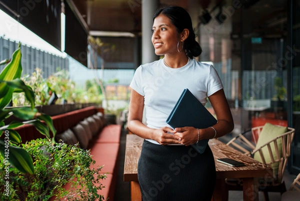 Obraz Confident and accomplished Business Professional thriving in a vibrant Modern Workspace setting