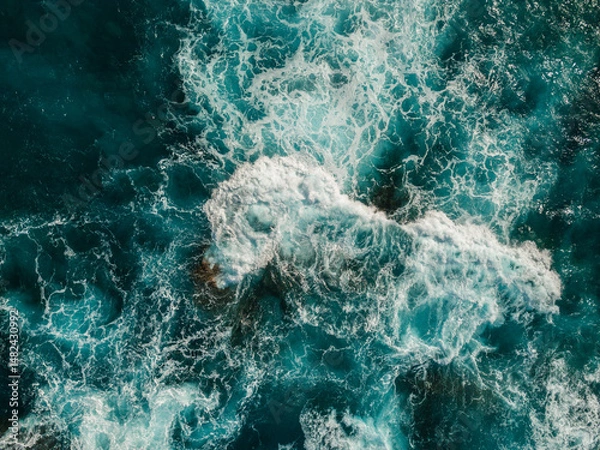 Obraz Aerial View of the Sea and Waves. The vast ocean stretches endlessly, with waves. Nature, tranquility, and adventure.	