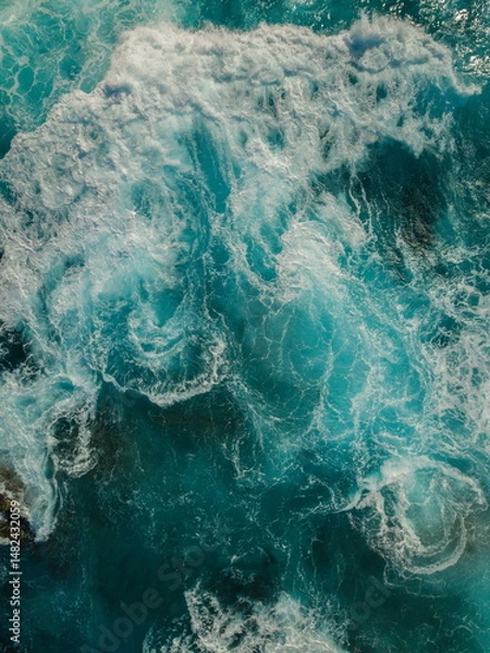 Obraz Aerial View of the Sea and Waves. The vast ocean stretches endlessly, with waves. Nature, tranquility, and adventure.	