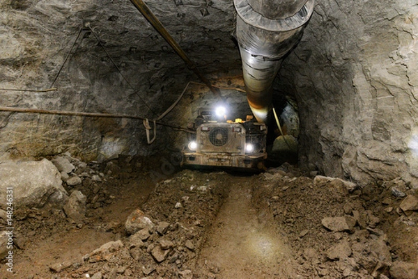 Obraz Mining industry. Metal ore mechanical transportation