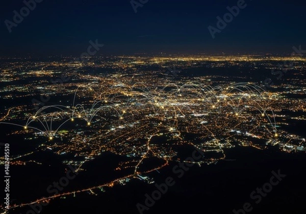 Fototapeta City lights at night show interconnected network across the urban landscape from above