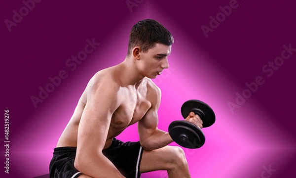 Obraz Young Man Working Out in the Gym with Weights. Focused and determined, he lifts during an intense strength training session. Fitness, motivation, and healthy lifestyle