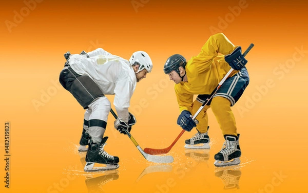 Obraz Ice Hockey Players in Action Under Neon Lights. Dynamic pose and intense atmosphere highlight the energy of the sport. Competition, teamwork, modern sports aesthetics..