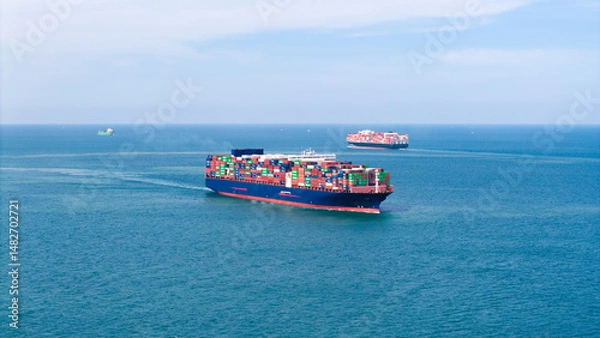 Fototapeta Top view Container ship full capacity approaching port International Container ship loading, unloading at sea port, Freight Transportation, Shipping,Logistics, import export, Transportation. Global