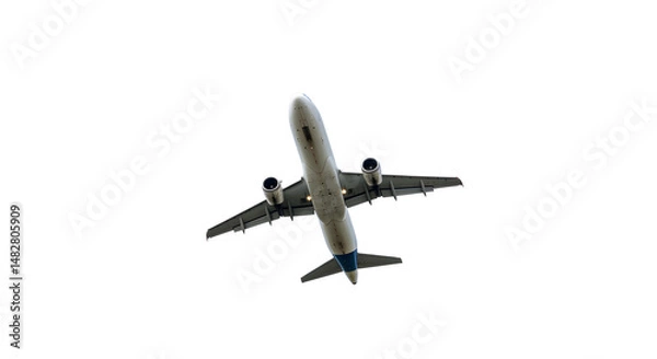 Fototapeta Airplane Flying in Clear White Sky Showing Underside and Engines