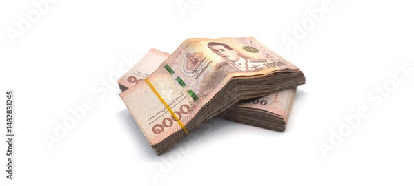 Fototapeta 1.000 baht banknotes stacked on a white background. Finance and currency concept. Exchange rate.