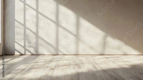 Fototapeta Empty room with a wooden floor and a large window on the left side. the walls are painted in a light beige color and the floor is made of light-colored wood planks.