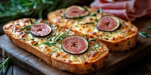 Fototapeta Delicious open-faced fig and cheese toasts with fresh herbs on wooden board in cozy setting