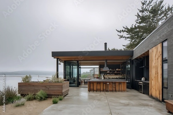 Fototapeta Waterfront property with a kitchen captured in overcast sky, showing modern architecture, detailed textures, and clean surroundings.
