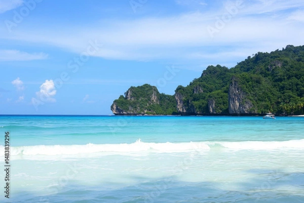 Obraz Serene Tropical Paradise with Crystal Clear Waters and Lush Green Hills
