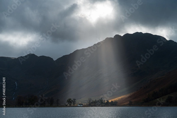 Fototapeta Buttermere lake and Haystacks with sunbeams in Lake District. England
