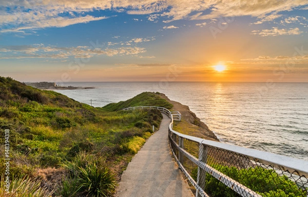 Fototapeta Seaside path at sunrise in Newcastle, Australia